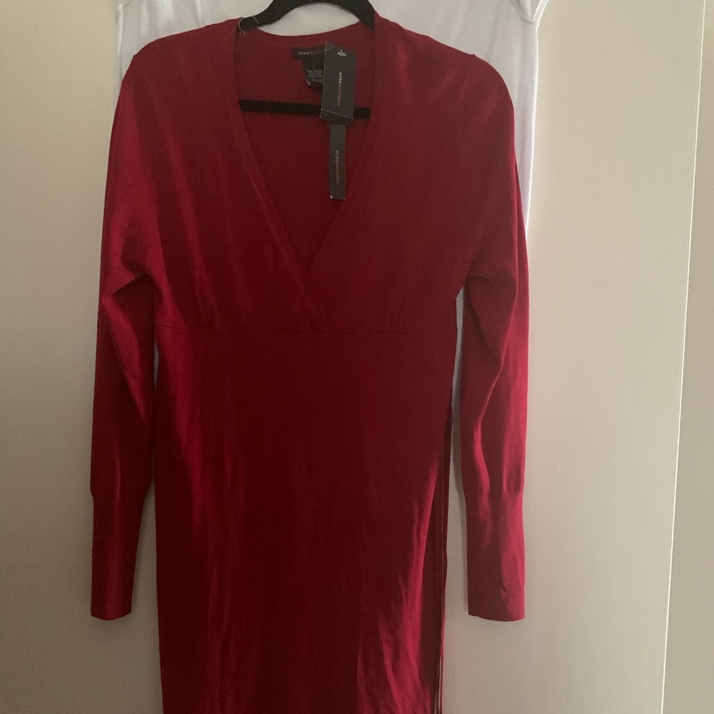 Light weight sweater dress it’s actually burgundy